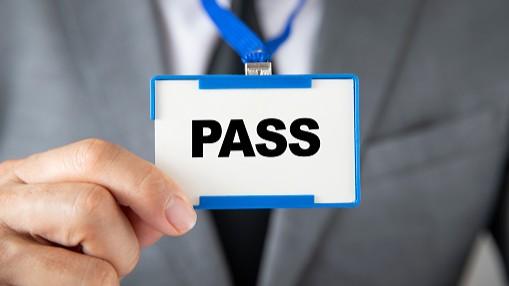 person holding annual pass